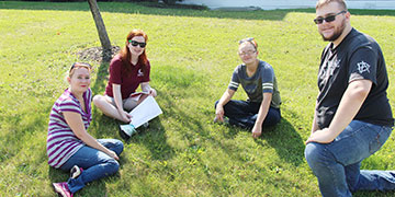 Students outside enjoying the nice weather