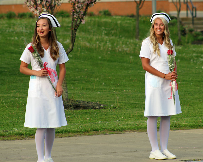 Nursing Students holding roses
