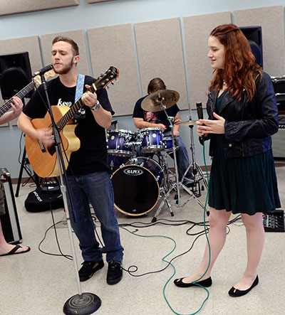 School of Media and Arts student playing an instrument