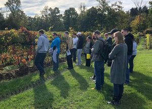 Students at the Buttonwood Grove Winery looking at the vineyard