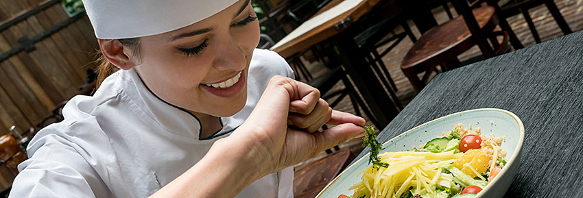 Culinary Arts student preparing food